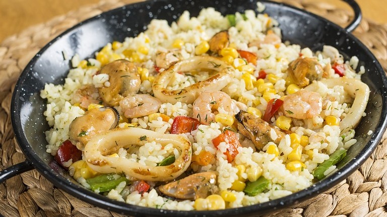 Which country's typical food is Paella?