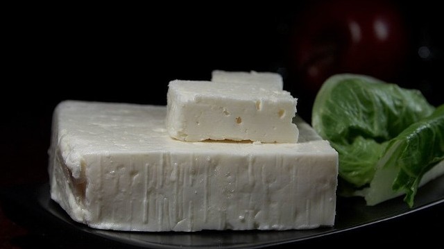 What is the country of origin of the cheese called "feta"?